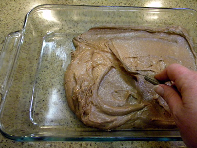 Spreading crust batter in pan