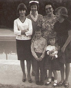 Aunt Bev, Mom, Grandma Lorts, Aunt Patty, my brother, Dennis, Me and my doll by the pool. Must have been winter time, or we'd be in it!