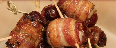 caramelized onion stuffed dates in bacon